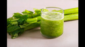 Smoothie with celery stalks jpg